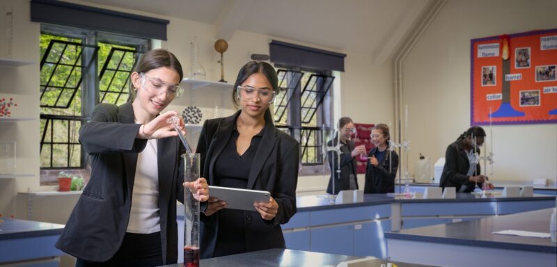 Hero image for Sixth Form Girls School | Commercial Photographer Manchester | Greg Harding Commercial Photographer Photograph of sixth form girls studying chemical reactions